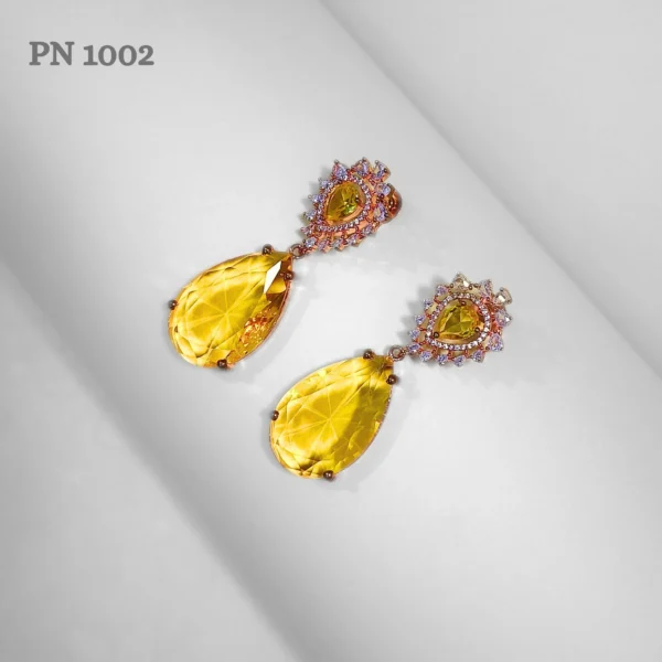 Yellow american diamond earrings design for girls