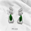 Big green single ad stone earrings designs for girls online in india