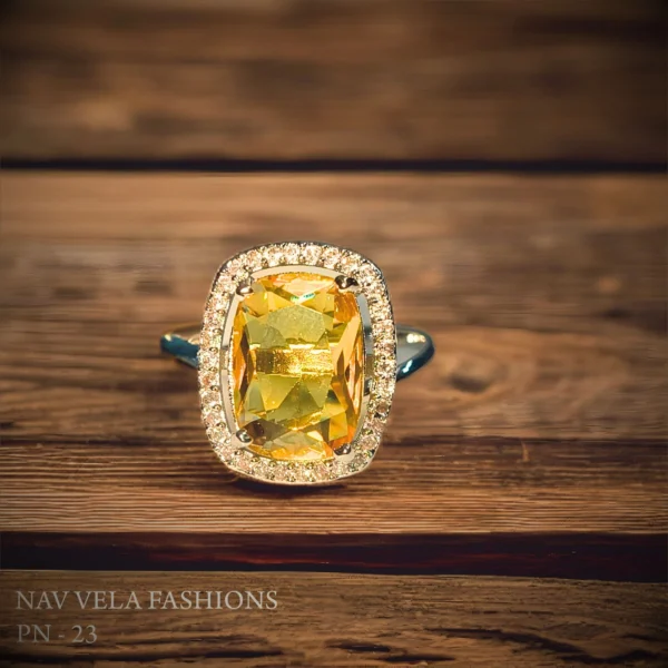 Imitation yellow american diamond ring